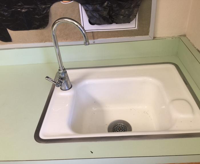 Sink with gooseneck fixture